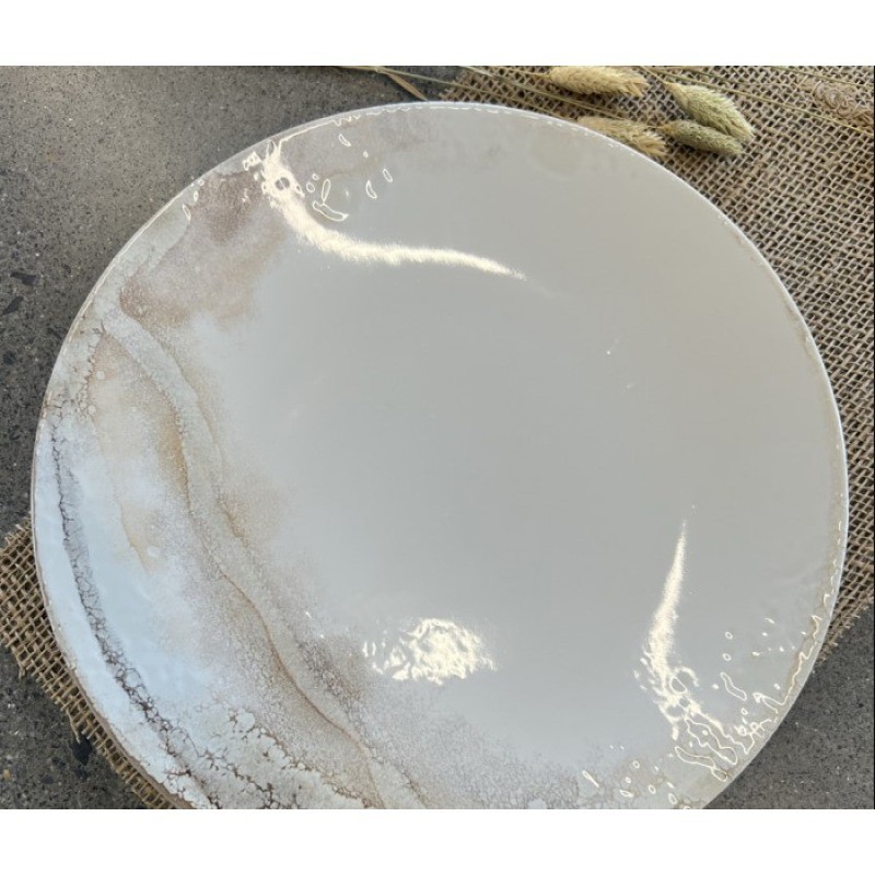 Assiette marbrée en grès