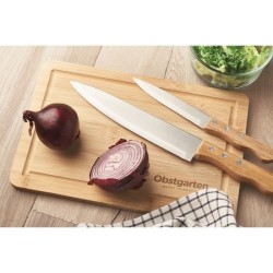 Planche à découper en bambou et couteaux